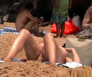 Naturist girl in her daily life in beach