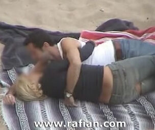 Euro couples caught tearing up on the beach from voyeurs
