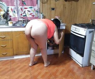 stepmom in the kitchen with pinkish g-string