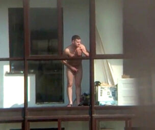 Bare dude on the balcony in spy hidden cam flick